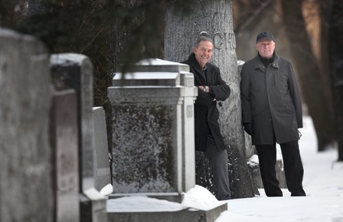 Wayne Rogers, executive director of the Friends of Historic Elmwood Cemetery (left) and  Jim Baker, also with Chairman of the Friends of Historic Elmwood Cemetery  pose at the Elmwood Cemetery Friday. See Kevin Rolason's story. January 30, 2015 - (Phil Hossack / Winnipeg Free Press)