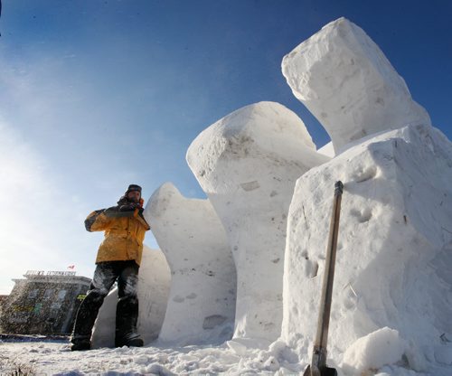 Artist  Denis Vrignon-Tessier works on his snow sculpture for the Festival du Voyageur on Marion at St. Mary's Ave. Saturday afternoon.  Standup photo  Jan 31, 2015 Ruth Bonneville / Winnipeg Free Press