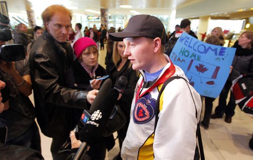 SPORTS - CURLING - Team Manitoba, Canadian champs arrive home. Skip Braden Calvert talks to the media at the the airport. BORIS MINKEVICH / WINNIPEG FREE PRESS  FEB 2, 2015