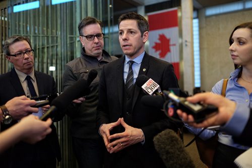 Mayor Brian Bowman holds his "100 Days in Office" press conference just outside council chambers at City Hall Monday afternoon. 150202 February 02, 2015 Mike Deal / Winnipeg Free Press