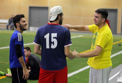 LOCAL - Newcomer men who meet every Friday night to play soccer and hang out with the guys so theyre not as isolated and stressed. Here is some of the men from Iraq having some laughs while they wait for their field time to happen(10pm). BORIS MINKEVICH / WINNIPEG FREE PRESS  JAN. 30, 2015