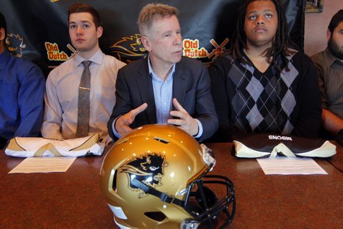 LOCAL - Bison football recruits. Team coach Brian Dobie announces to the media the new recruits from the team that sit with him. BORIS MINKEVICH / WINNIPEG FREE PRESS  FEB. 3, 2015