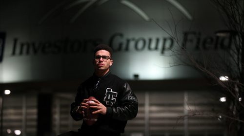 Jamel Lyles moved from his home school of Lord Tweedsmuir in Vancouver to Dakota Collegiate in Winnipeg to play with Brian Dobie and the Bisons! See story. Jamel poses in front of Investor's Group Stadium Tuesday evening. See story. February 3, 2015 - (Phil Hossack / Winnipeg Free Press)