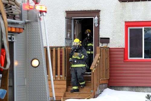 Fire Fighters put out a fire at a home on 351 Ottawa Ave.Tuesday.  One occupant escaped without injury.  Feb 03, 2015 Ruth Bonneville / Winnipeg Free Press