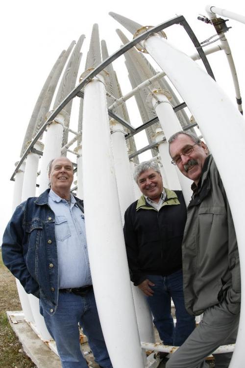 John Woods / Winnipeg Free Press / September 18/07- 070918  - (LtoR) Colin Vann, John Jardine and Bill Watt, founders of Arctic Foundations of Canada stand among examples of their product thermo syphons at the Ellie arena Tuesday September 18/07.   Arctic Foundations of Canada Inc. manufactures thermo syphons which are used to stabilize frozen soils by cooling perma frost ground when it begins to thaw.