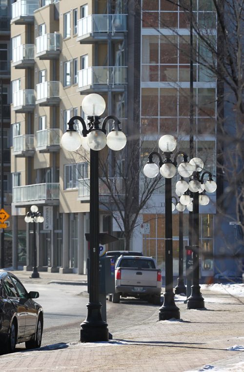 49.8 Feature: Housing market in Winnipeg Ornate streetlights on Waterfront drive next to newly built condo's along the Red River in the Exchange District in downtown Winnipeg.  Feb 04, 2015 Ruth Bonneville / Winnipeg Free Press