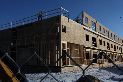 49.8 Feature: Housing market in Winnipeg Construction workers work on a condo development on St. Annes Rd. near the Perimeter Hwy. called "The Woods at Creek Bend" Wednesday afternoon.  Feb 04, 2015 Ruth Bonneville / Winnipeg Free Press