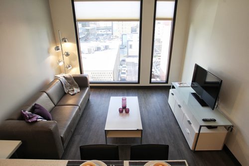 The living room of one of the apartments at Marie Rose Place 207 Edmonton St a new six-storey building thatÄôs now open and provides supportive housing for immigrant and refugee women. 150205 February 05, 2015 Mike Deal / Winnipeg Free Press