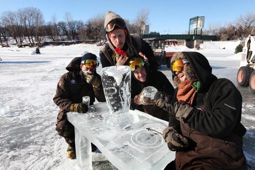 Four crew members of the Forks River Trail stop to have their picture taken after making a table of ice along with the help of Tina and Luca Soli of Norway (not in photo) with ice harvested from the Red River Thursday afternoon. Names from left, Thomas Jordan, Jordan Janisse, Kristian Jordan and Michael Jordan (far right).  Note: The names are correct.   Standup photo.  Feb 04, 2015 Ruth Bonneville / Winnipeg Free Press