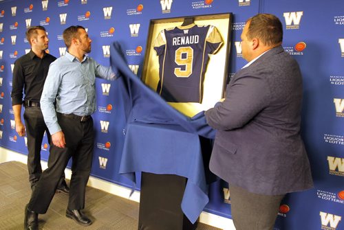 SPORTS - Mike Renaud announces his retirement to the media at the IFG Field media centre. Left to right Bombers General manager, Kyle Walters, Mike Renaud, and bomber President/CEO  Wade Miller.  BORIS MINKEVICH / WINNIPEG FREE PRESS  FEB. 5, 2015
