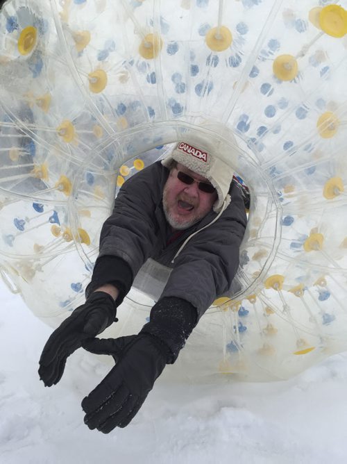 Rich Hince, owner of Games2U Winnipeg, poses with Free Press columnist Doug Speirs, in a life-sized clear plastic Hamster Ball, at Assiniboine Park. February 6, 2015 Tyler Walsh / Winnipeg Free Press