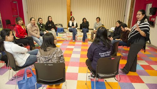 150206 Winnipeg - DAVID LIPNOWSKI / WINNIPEG FREE PRESS (February 06, 2015)  Roselyn Advincula leads a session with newcomer moms that are participating in a community development program run by the Aurora Family Therapy Centre at the ChildrenÄôs Museum at The Forks Friday February 6, 2015. The program is in place to help prevent moms from being isolated and help them in their settlement in Winnipeg.  Carol Sanders 49.8 feature about newcomers dealing with mental health issues and physical disabilities
