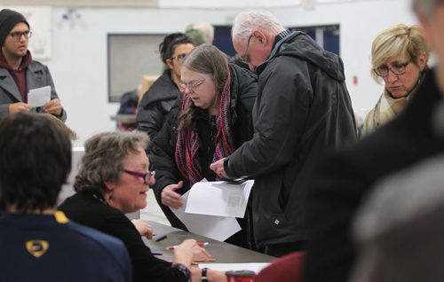 NDP NOMINATION MEETINGS - Members of the NDP party make their way to vote at the Southdale Community Club  Saturday afternoon. Feb 07, 2015 Ruth Bonneville / Winnipeg Free Press