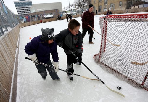 Kids play hockey at the West Broadway Snoball, Saturday, February 7, 2015. (TREVOR HAGAN/WINNIPEG FREE PRESS)