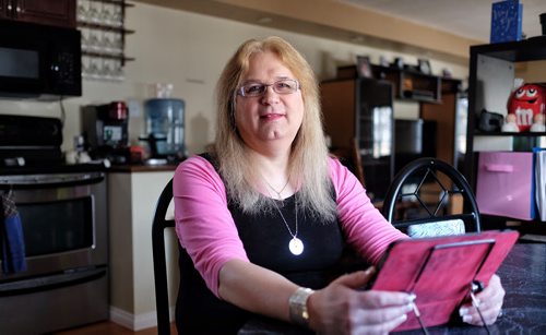 Rikki Dubois, a trans woman, is glad the province is changing the rules so people can change the gender on their birth certificate without having to show proof of sex-change surgery.  Rikki transitioned in 2010 Äì a year before having surgery Äì and said she was hassled by Manitoba Health because her health card said male when she was an female.  150208 February 08, 2015 Mike Deal / Winnipeg Free Press