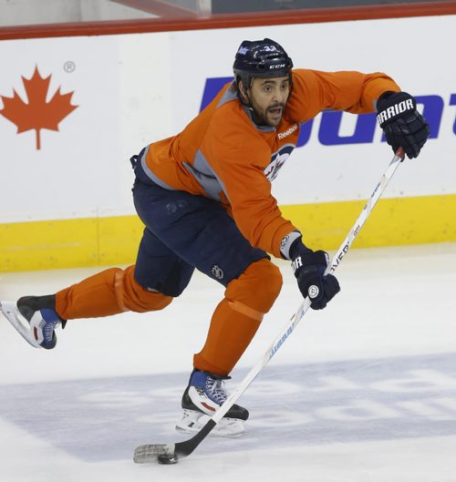 Winnipeg Jets Dustin Byfuglien  during a drill at the team's  practice in the MTS Centre Monday in preparation for Tuesday night's game against the Minnesota Wild. Ed Tait/Time Campbell stories Wayne Glowacki/Winnipeg Free Press Feb.9  2015