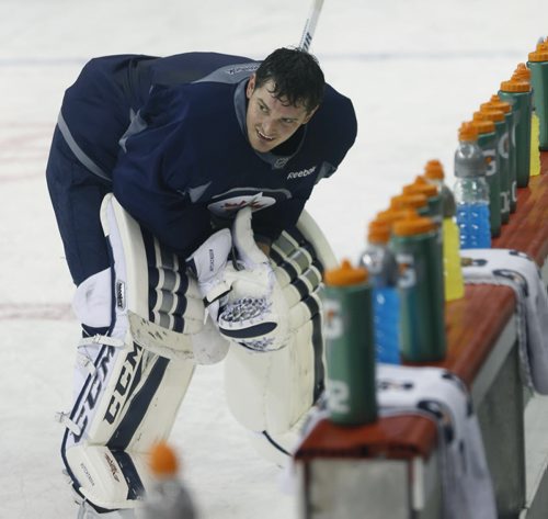 Winnipeg Jets goaltender  Michael Hutchinson at the team's  practice in the MTS Centre Monday in preparation for Tuesday night's games against the Minnesota Wild. Ed Tait/Time Campbell stories Wayne Glowacki/Winnipeg Free Press Feb.9  2015