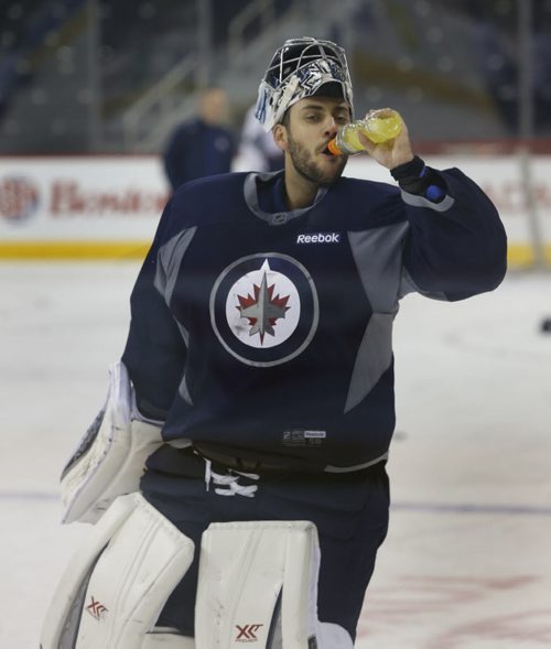 Winnipeg Jets goaltender Ondrej Pavelec  at the team's  practice in the MTS Centre Monday in preparation for Tuesday night's game against the Minnesota Wild. Ed Tait/Time Campbell stories Wayne Glowacki/Winnipeg Free Press Feb.9  2015