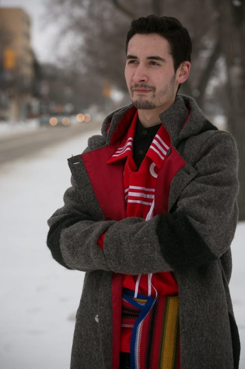 Justin Johnson, who identifies as Metis and Franco-Manitoban is studying Master of Arts in Indigenous Governance at University of Winnipeg. With his thesis he is hoping to develop a Metis philosophy. On Justin Johnson's sash is the red version of the Metis flag (left) and the flag of the Union nationale métisse Saint-Joseph du Manitoba February 09, 2015 (Melissa Tait / Winnipeg Free Press)