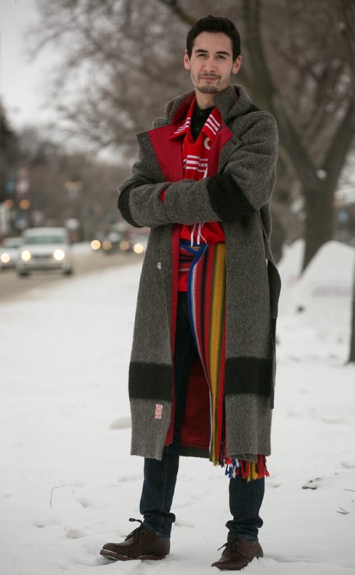Justin Johnson, who identifies as Metis and Franco-Manitoban is studying Master of Arts in Indigenous Governance at University of Winnipeg. With his thesis he is hoping to develop a Metis philosophy. On Justin Johnson's sash is the red version of the Metis flag (left) and the flag of the Union nationale métisse Saint-Joseph du Manitoba February 09, 2015 (Melissa Tait / Winnipeg Free Press)