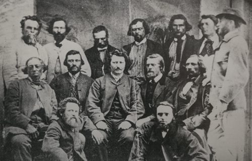 1870 photograph from the Archives of Manitoba. Lousi Riel (centre) is surrounded by his council, including Justin Johnson's great-great-great-grandfather Andr¾© Beauchemin (back row, third from right).