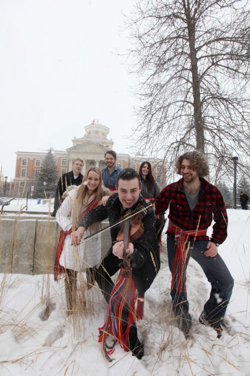 49.8 feature on What / Who is Metis?  Metis University Students' Association President: Brad Boudreau  (fiddle) along with student members of the associations are proud of their Metis roots as they wear their  sashes for a photo at the U of M. Names: Alana Robert (left, blond), Chris Allard (left rear), Erik Klassen (rear centre,wt blue shirt), Chalena McKay (long black hair), Jamal Abas (right, curly hair) and Metis University Students' Association President: Brad Boudreau (front wt fiddle).  Feb 10, 2015 Ruth Bonneville / Winnipeg Free Press