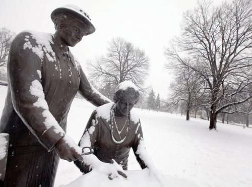 Nellie McLung (seated right) seen with Louis McKinny (standing) in a legislative ground statue. See Jenn Zoratti's story.  February 10, 2015 - (Phil Hossack / Winnipeg Free Press)
