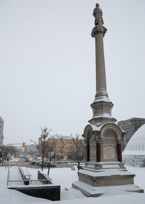 The large monument between the Concert Hall and Manitoba Museum is dedicated to the fallen members of the 90th Rifles (now the Royal Winnipeg Rifles) who defeated the Riel led Metis forces at Fish Creek and Batoche. The soldier at the top is representative of a member of the Winnipeg Rifles, most likely wearing formal dress. 150210 - Tuesday, February 10, 2015 - (Melissa Tait / Winnipeg Free Press)