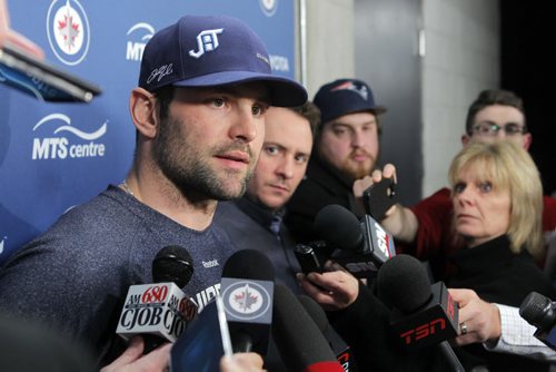 SPORTS - Winnipeg Jets player Mark Stuart talks to the media after the teams trade announcement at the MTS Centre. BORIS MINKEVICH / WINNIPEG FREE PRESS  FEB. 11, 2015