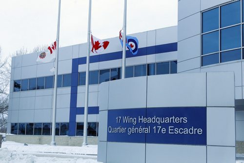 NEWS - Flags fly at half mast at 17 Wing in Winnipeg. SAR Tech Sergeant Mark Salesse died during training in Alberta. BORIS MINKEVICH / WINNIPEG FREE PRESS  FEB. 12, 2015