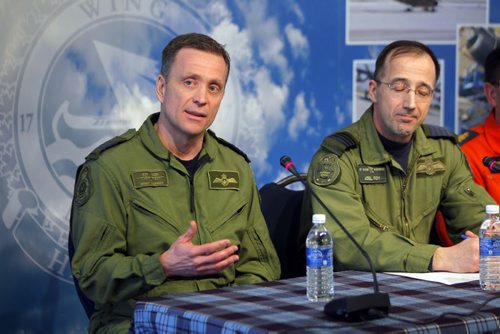 NEWS - left to right - Commanding Officer  (CO) Lieutenant- Colonel Brent Andrews 435 Transport and Rescue Squadron and 17 Wing Commander, Colonel Joël Roy during the press conference at 17 Wing. Topic: SAR Tech Sergeant Mark Salesse died during training in Alberta. BORIS MINKEVICH / WINNIPEG FREE PRESS  FEB. 12, 2015