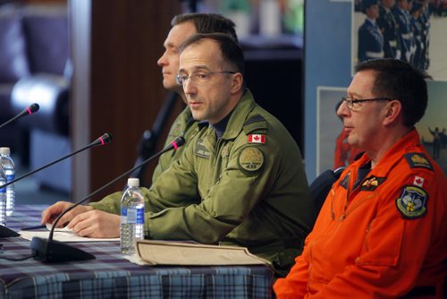 NEWS - back to front- Commanding Officer  (CO) Lieutenant- Colonel Brent Andrews 435 Transport and Rescue Squadron, (middle) 17 Wing Commander, Colonel Joël Roy, and Chief Warrant Officer (CWO) André  Daigle - Search and Rescue Technician Senior Occupation Advisor during the press conference at 17 Wing. Topic: SAR Tech Sergeant Mark Salesse died during training in Alberta. BORIS MINKEVICH / WINNIPEG FREE PRESS  FEB. 12, 2015