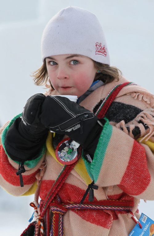 Nine-year-old Remi Lepage sips hot chocolate while attending The Festival du Voyageur  Saturday with family.  Feb 14, 2015 Ruth Bonneville / Winnipeg Free Press