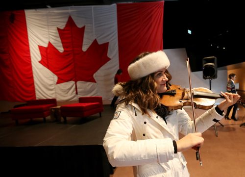Sierra Noble performs during a flag raising event at the CMHR on the 50th anniversary of our current Canadian Flag, Sunday, February 15, 2015. (TREVOR HAGAN/WINNIPEG FREE PRESS)