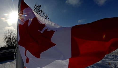 A flag outside the CMHR on the 50th anniversary of our current Canadian Flag, Sunday, February 15, 2015. (TREVOR HAGAN/WINNIPEG FREE PRESS)