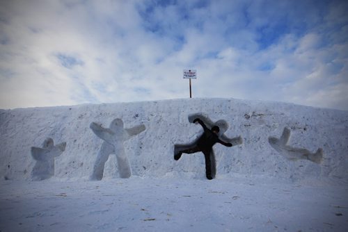 February 15, 2015 - 150215  -  Tyler Ross plays in a snow sculpture at The Festival du Voyageur Sunday, February 15, 2015.  John Woods / Winnipeg Free Press