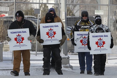 February 15, 2015 - 150215  -  CP Rail workers walk the picket line at Winnipeg rail yard on McPhillips Sunday, February 15, 2015.  John Woods / Winnipeg Free Press