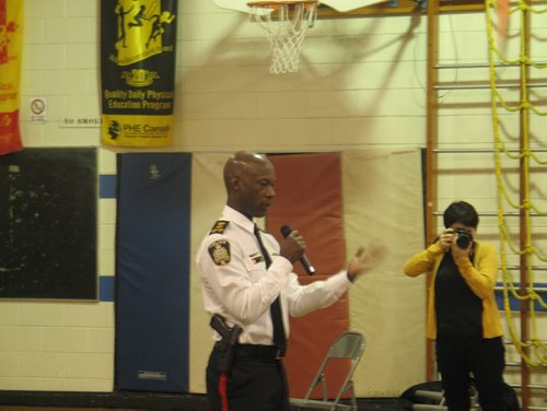 Canstar Community News Feb. 10, 2015 - Winnipeg police chief Devon Clunis spoke to the kids at Hampstead School before an I Love to Read event in the school gym. (SHELDON BIRNIE/CANSTAR COMMUNITY NEWS/HERALD).