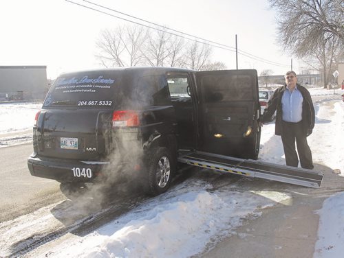 Canstar Community News Feb. 4, 2015 - Gary Jakeman of Sunshine Limo Services shows off Winnipeg's first and only accessible limousine in front of his Elmwood home. (SHELDON BIRNIE/CANSTAR COMMUNICATIONS/HERALD)