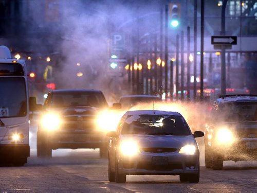 Exhaust fog rises during the  extreme cold weather Wednesday morning in downtown Winnipeg. Wayne Glowacki/Winnipeg Free Press Feb.18   2015