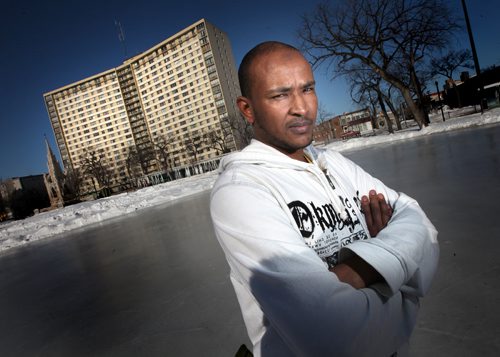 Said Ali poses in a frigid foreign environment Wednesday. He came from Somalia and had to adjust to the cold. He found indoor activities like soccer. See Carol Sanders story. February 18, 2015 - (Phil Hossack / Winnipeg Free Press)