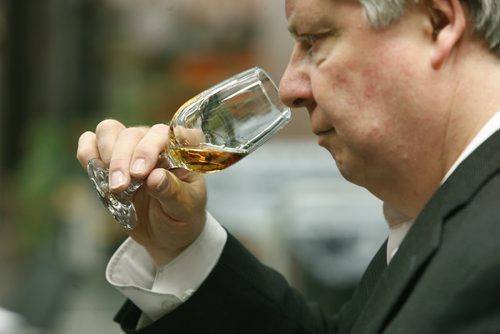 Ent./Uptown.  Gary Dawyduk  sniffs the aroma of Knob Creek straight bourbon whiskey. For feature with Gary Dawyduk, Liquor Marts product ambassador and Ben tasting and talking about different whiskies at the Grant Park Liquor Mart in their education centre.  Ben MacPhee-Sigurdson  story Wayne Glowacki/Winnipeg Free Press Feb.18   2015