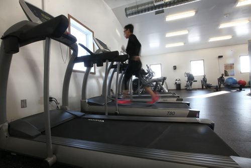 Cynthia Murdock works out on the treadmill a the newly built Fisher River Fitness Centre powered by geothermal heat.  Feature story on how sustainable energy sources like  geothermal and solar are being implemented on First Nation reserves like Peguis and Fisher River and its positive impact on the people and our province.   See Alex Paul story.   Feb 17, 2015 Ruth Bonneville / Winnipeg Free Press