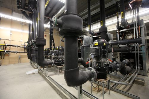 Dozens of hoses and pipes interconnect to the furnaces in the mechanical room in the Peguis Arena which was built in spring of 2014 and is powered by geothermal energy.    Feature story on how sustainable energy sources like  geothermal and solar are being implemented on First Nation reserves like Peguis and Fisher River and its positive impact on the people and our province.   See Alex Paul story.   Feb 17, 2015 Ruth Bonneville / Winnipeg Free Press