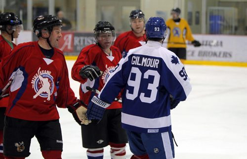 SPORTS/LOCAL/BIZ - The Mike Keane Celebrity Hockey Classic, held this year on February 18 and 19, 2015 at MTS Iceplex. Doug Gilmour celebrates a goal with the team he was assigned to. BORIS MINKEVICH/WINNIPEG FREE PRESS FEB. 19, 2015