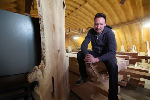 Story: J. Neufeld,  Local wood artist and owner of Wood Anchor recently made a  large, oak table for Canada House.    See Story.  Feb 19, 2015 Ruth Bonneville / Winnipeg Free Press