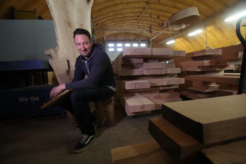 Story: J. Neufeld,  Local wood artist and owner of Wood Anchor recently made a  large, oak table recently shipped to Canada House.    See Story.  Feb 19, 2015 Ruth Bonneville / Winnipeg Free Press