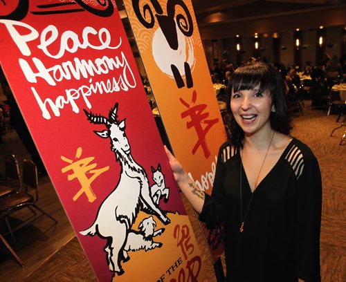 Kal Barteski, brush script artist, with the year of the sheep banners that were revealed at the Chinese New Year Banquet at the Kum Koon Garden restaurant.  150219 February 19, 2015 Mike Deal / Winnipeg Free Press