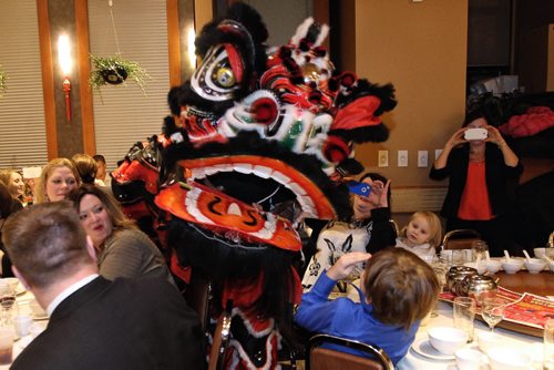 Lion Dancers mover through the room at the beginning of the Chinese New Year Banquet at the Kum Koon Garden restaurant.  150219 February 19, 2015 Mike Deal / Winnipeg Free Press