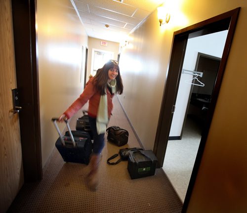 Actress Heather Russell moves into her "suite" at Pilot Mound's Hotel as the troupe arrives for their run at the Crystal City's Parklane Theatre.  See Kevin Prokosh story. February 19, 2015 - (Phil Hossack / Winnipeg Free Press)